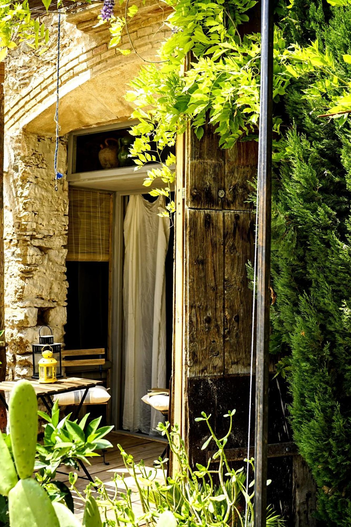 Can Tat, Loft In A Old Coach House Sant Jordi Desvalls Eksteriør bilde
